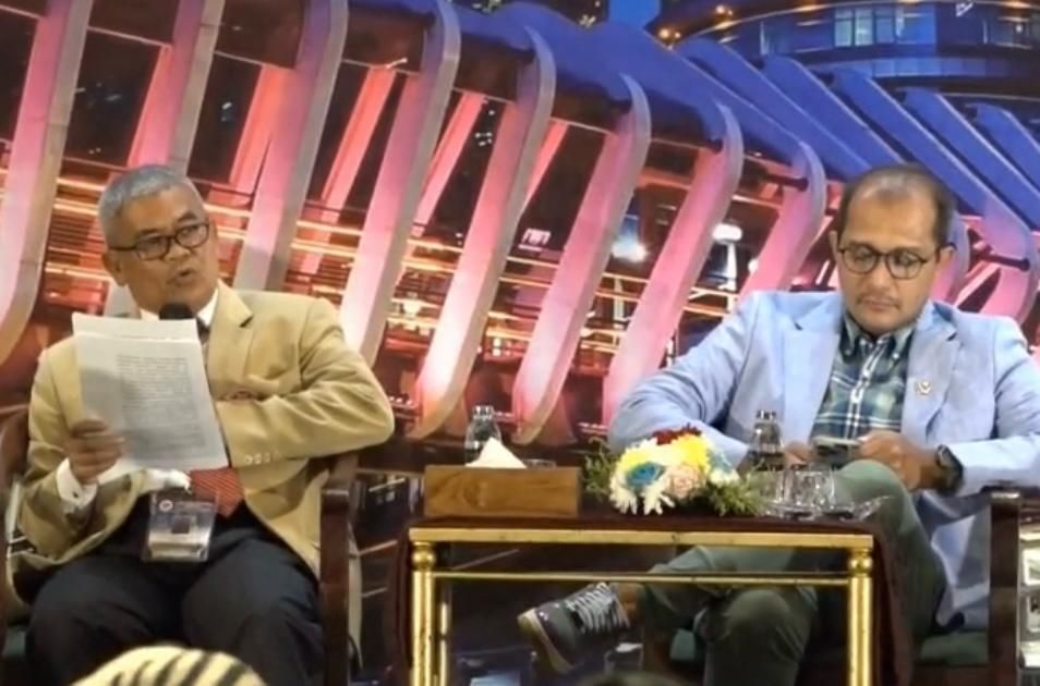 Wakil Menteri Hukum Edward Omar Sharif Hiariej di acara Rakernas Ikadin 2025. 