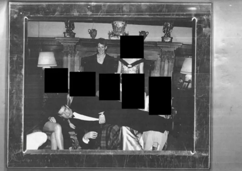 Foto yang tampaknya menunjukkan Andrew Mountbatten-Windsor terbaring di atas lima orang, dengan wajah mereka telah disamarkan. <b>(BBC)</b>