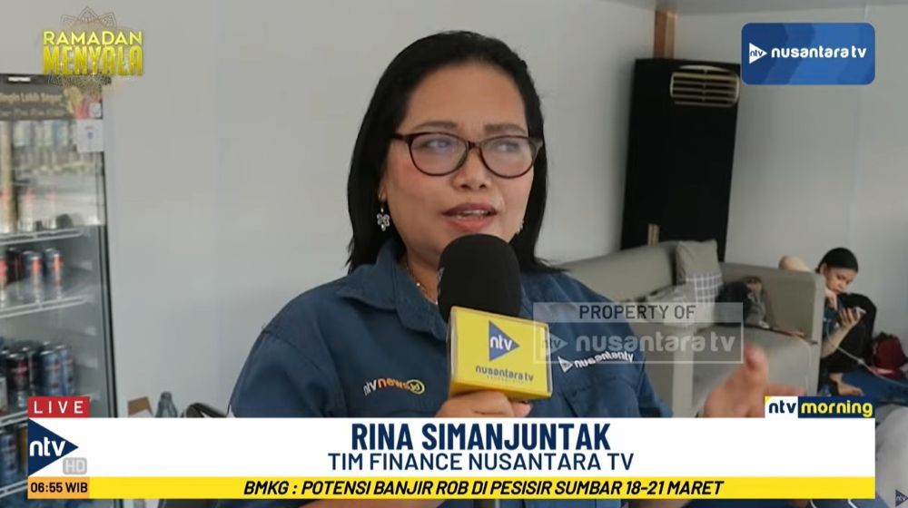 Tim Finance Nusantara TV, Rina Simanjuntak. 