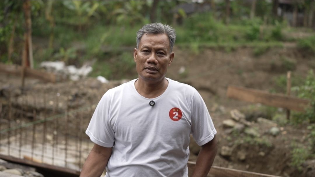 Suminto, salah satu warga setempat, menyatakan bahwa pembangunan jembatan ini akan sangat membantu mobilitas masyarakat menuju fasilitas pendidikan, lahan pertanian, serta akses pasar tradisional di wilayah seberang. <b>(Bakom)</b>