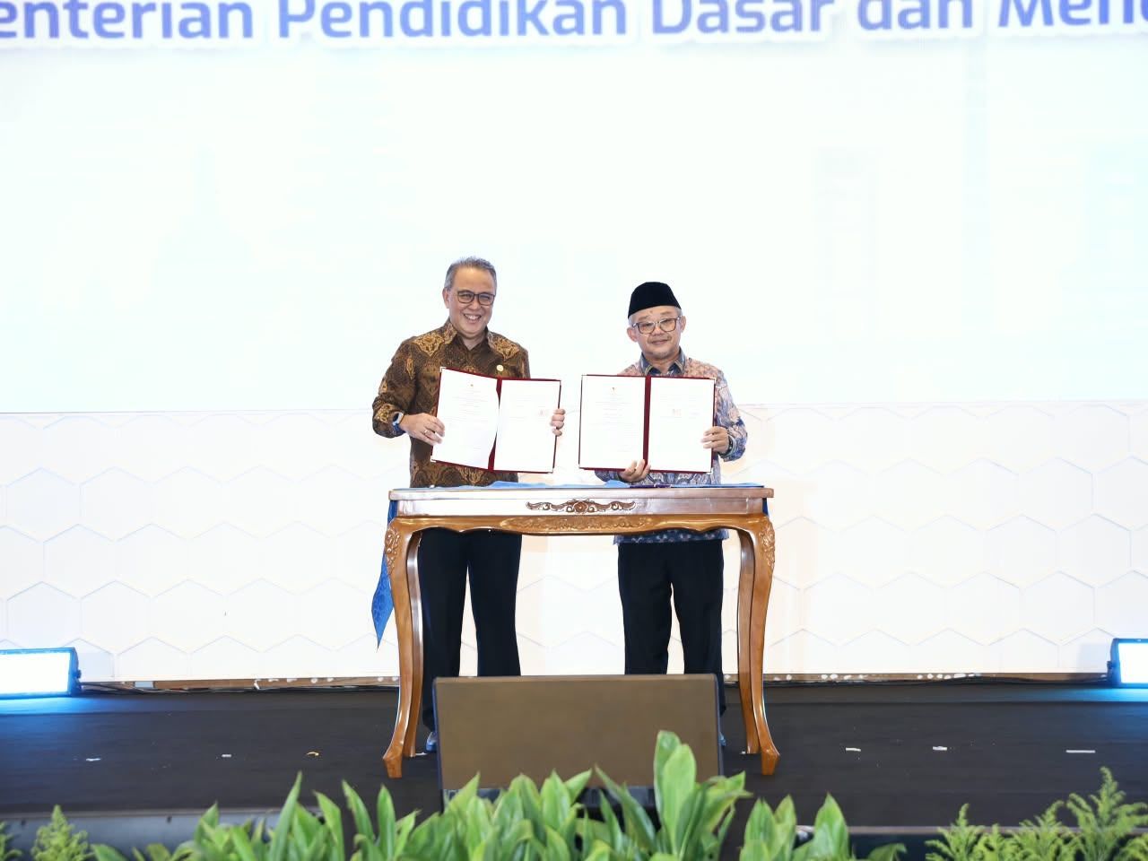 Penandatanganan Nota Kesepahaman antara OJK dan Kementerian Pendidikan Dasar dan Menengah (Kemendikdasmen) yang menjadi landasan strategis penguatan literasi keuangan syariah di satuan pendidikan.