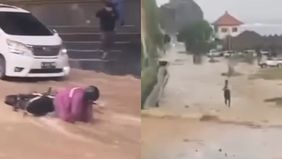 Beredar video memperlihatkan banjir menerjang aksi menuju Pantai Pandawa, Bali. Hal tersebut menjadi viral di media sosial.