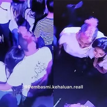 Pria Ini Peluk Pacarnya saat Konser, Tapi Tangannya Malah Elus Perempuan Lain