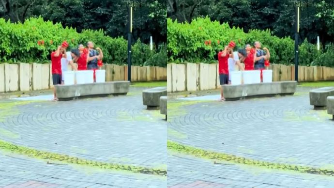Viral Suporter Timnas Indonesia Lakukan Ritual Mandi Kembang di GBK