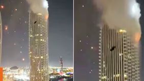 Warga sebuah gedung yang berada di kawasan ikonik Dubai Creek Harbour dievakuasi setelah sebuah drone menghantam menara hunian dan memicu kebakaran besar pada Kamis, 12 Maret 2026. 