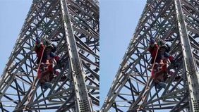 Beredar video memperlihatkan beberapa orang Damkar mencoba menyelamatkan driver ojol yang diduga hendak bunuh diri dengan cara memanjat tiang listrik Saluran Udara Tegangan Ekstra Tinggi (SUTET).