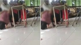 Seorang guru memberikan hukuman berlebih dengan cara dipiting dan dicekik ketika salah satu SMKN di Malang terlambat masuk.