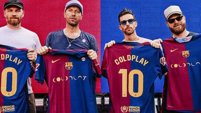 Coldplay bakal mengiringi orkestra Barcelona saat bertemu Real Madrid, pekan depan.